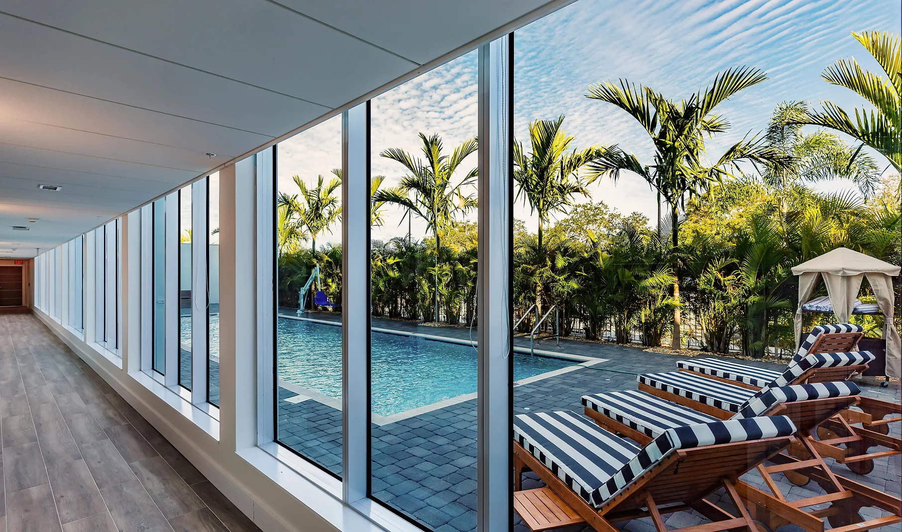 View Of Pool Through Large Windows
